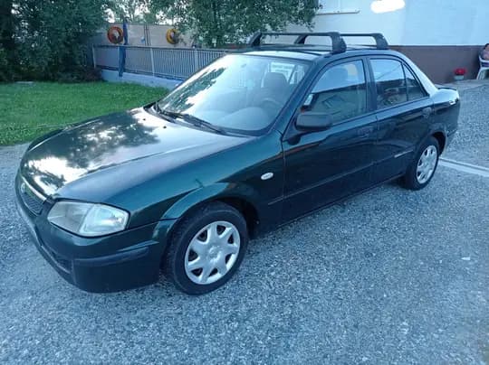 Mazda 323, reg. 1 god, zamjena 